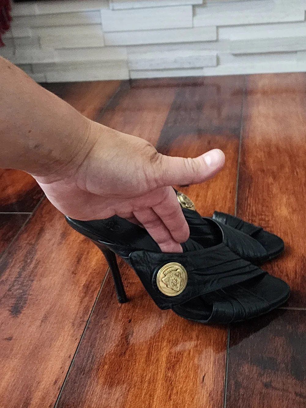 Gucci Black Leather High Heel Slide with Gold Medallion